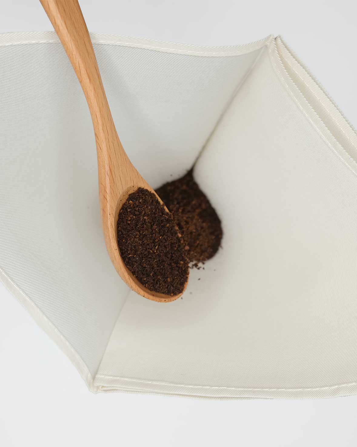 Reusable 100% silk coffee filter for chemex pour-over wooden spoon over silk coffee filter